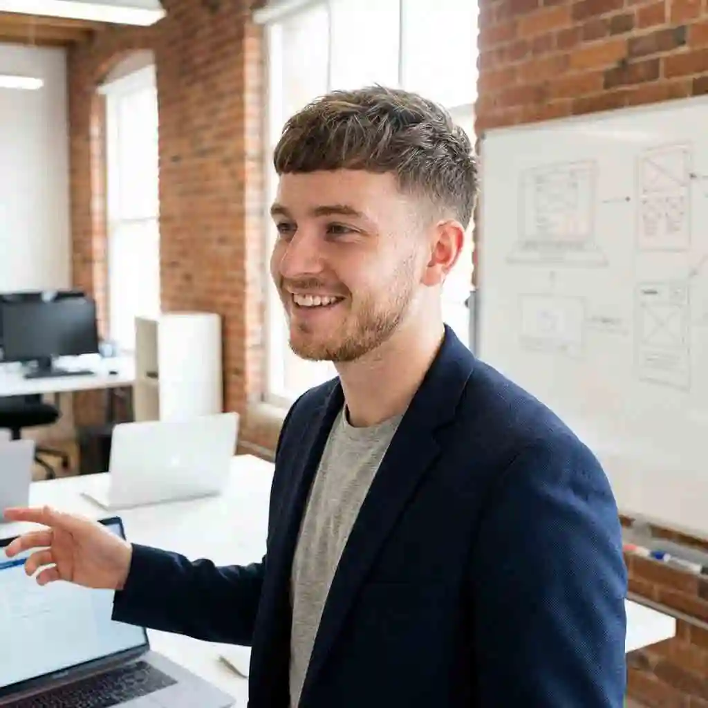Modern textured crop with stubble, a smart and stylish business casual choice that ranks high among the best hairstyles with beard for young professionals and managers.