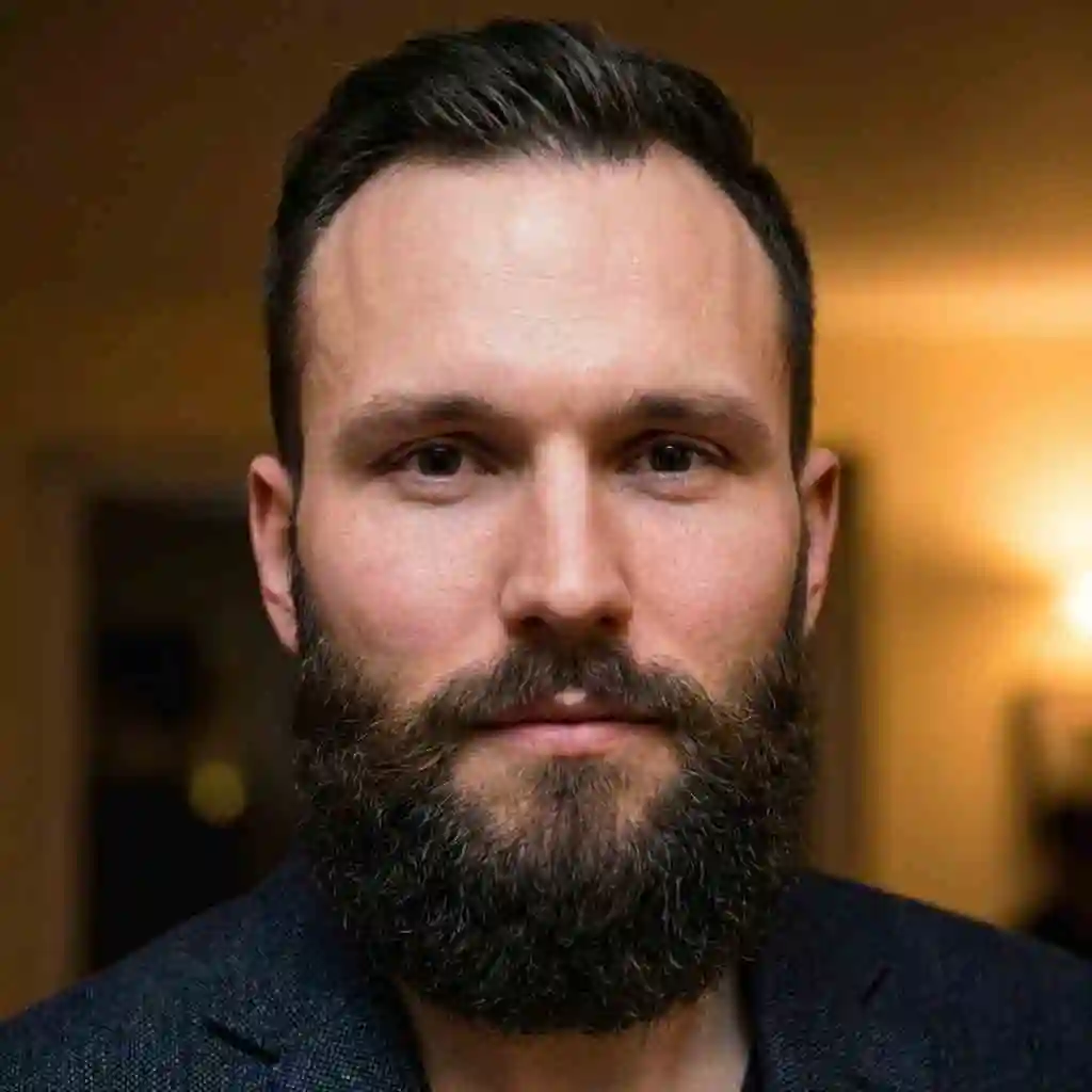 Man with a heart face wearing a Garibaldi Beard with a broad rounded base perfect for adding weight to the chin as a beard for your face shape.