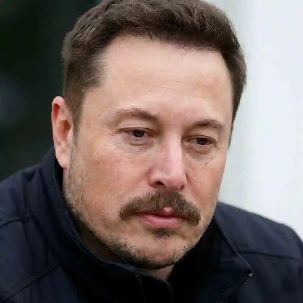 Man with a triangle face wearing a Beardstache drawing focus to the center and upper face which is a smart beard for your face shape strategy.