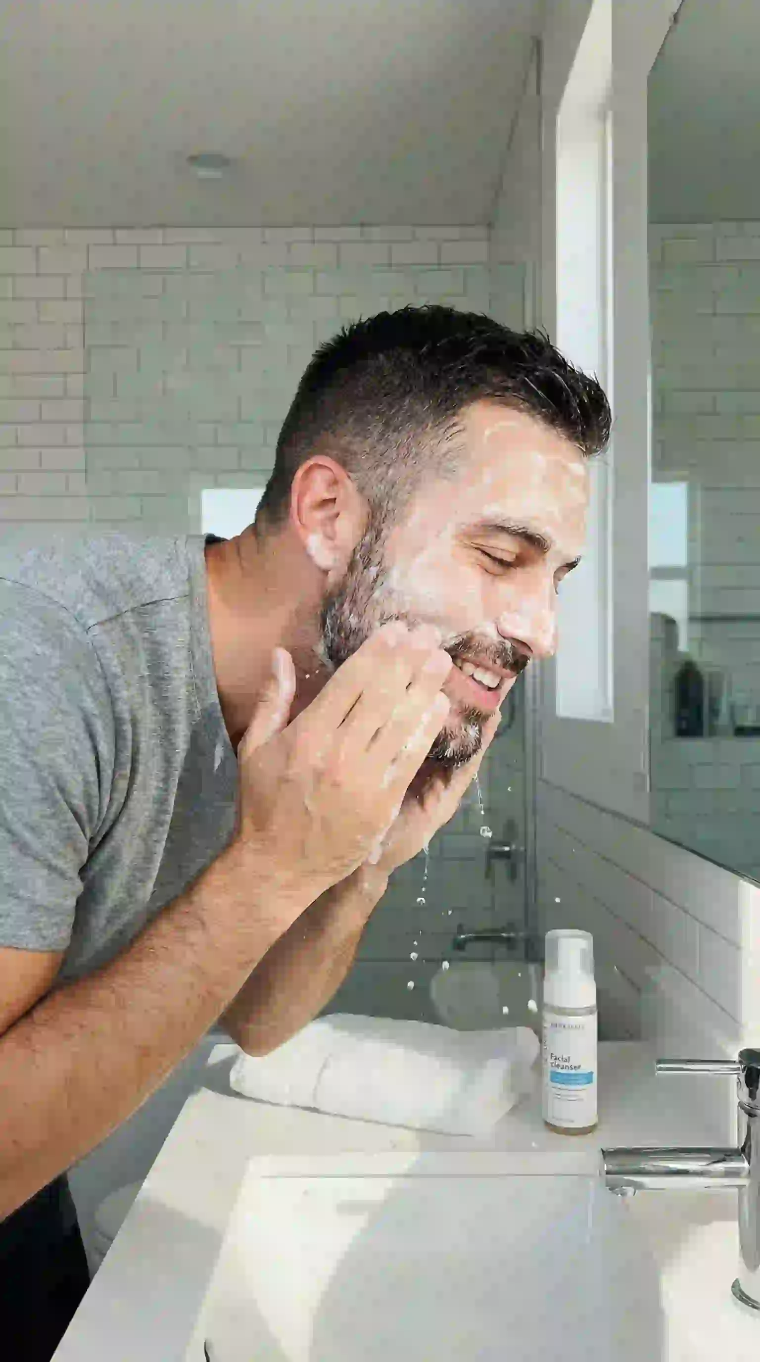 A close-up of skin exfoliation which helps unclog pores and is a vital step in the routine of how to remove patchy beard effectively.