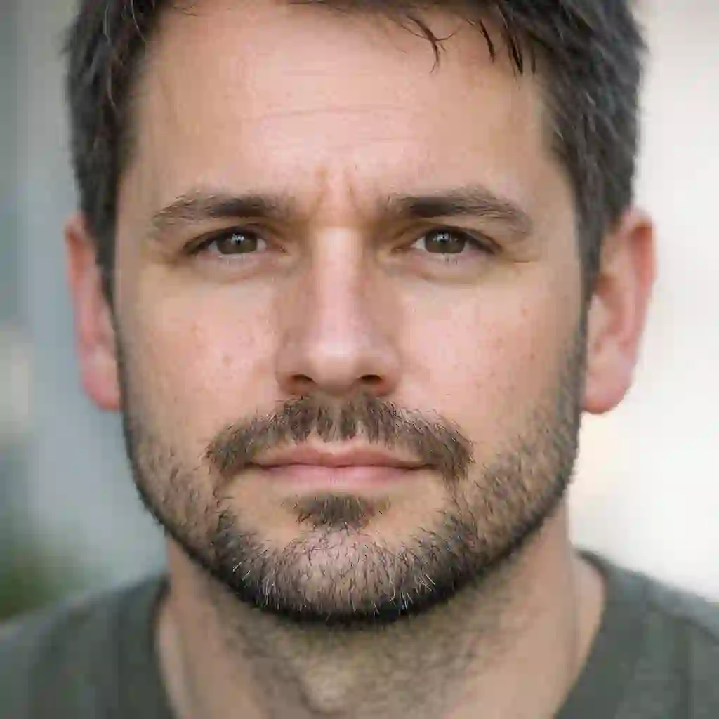 Close-up image of a man with a patchy mustache that fails to connect to the rest of the beard, serving as a clear example of why transitioning to a beard without mustache style is a practical and stylish solution.