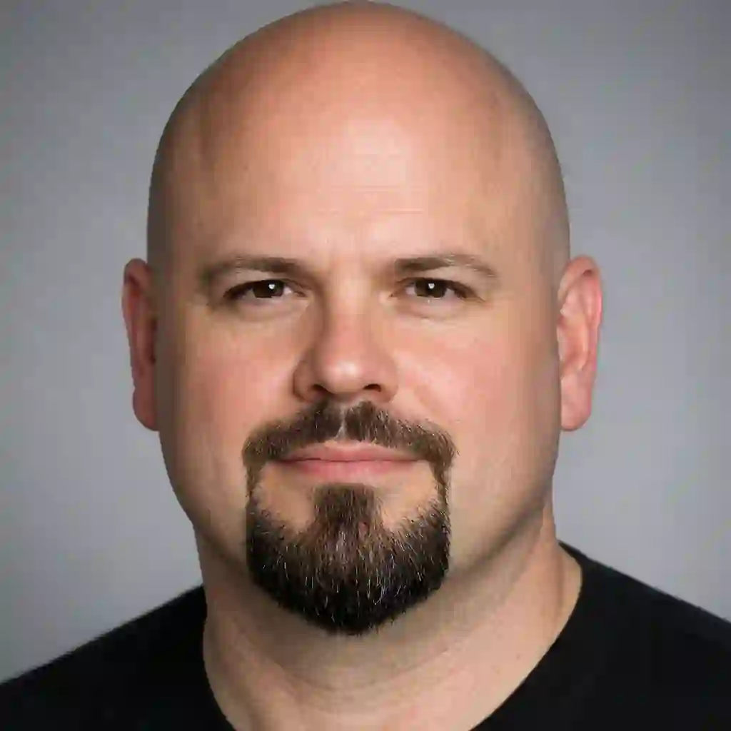 For men with a round face shape, selecting the best beard for bald head involves choosing elongated styles like the goatee or Van Dyke to create a slimming vertical focal point and add defined structure.