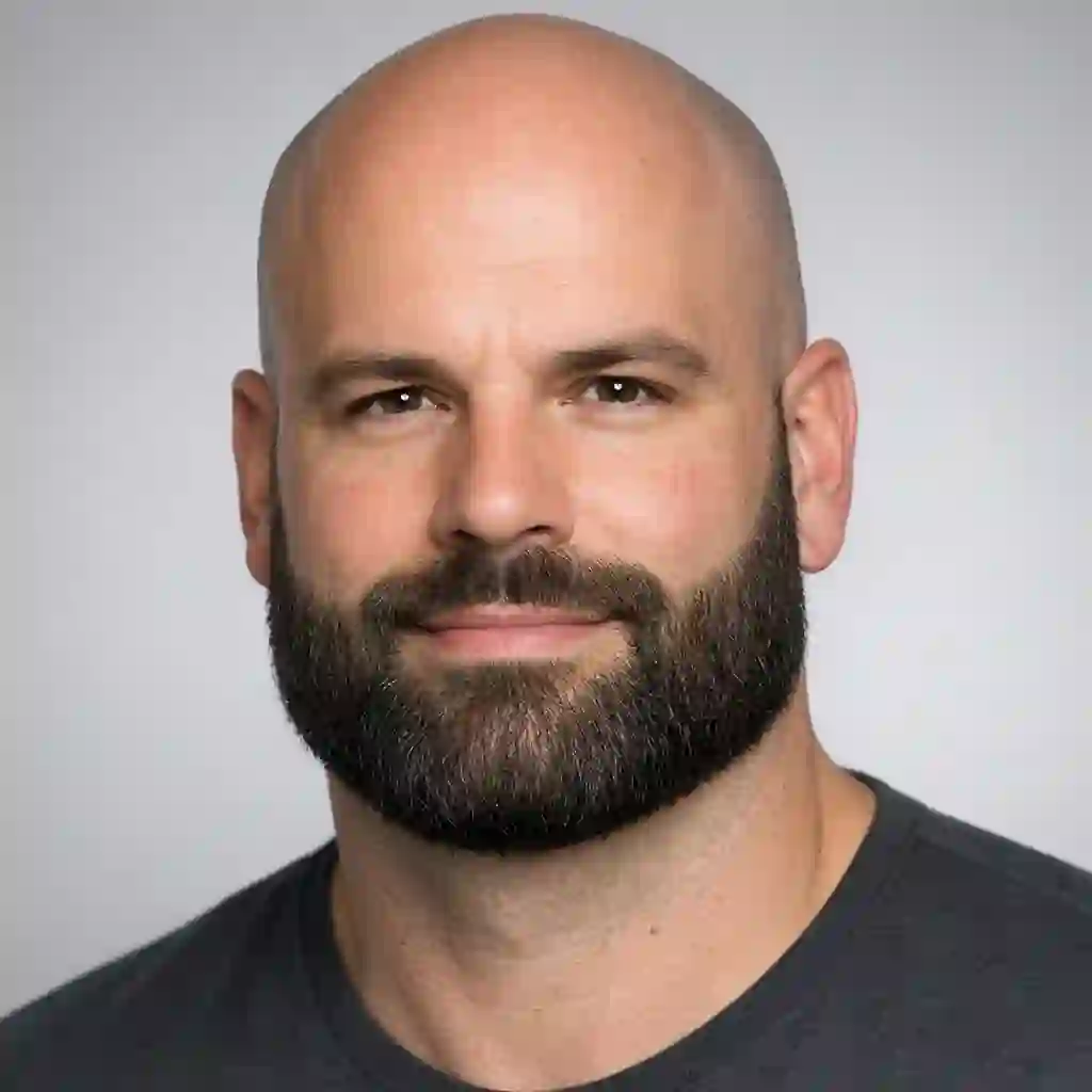 If you have a strong square jawline, the best beard for bald head includes softer, rounded options like the circle beard or a full beard bald look to balance and soften those sharp facial angles.